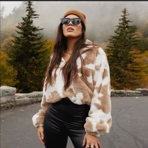 Kittenish In a Daze Cow Print Quarter Zip